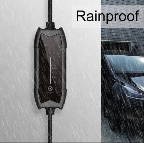Black rainproof car charging cable in heavy rain with water droplets